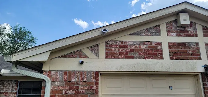 Outdoor security camera on home